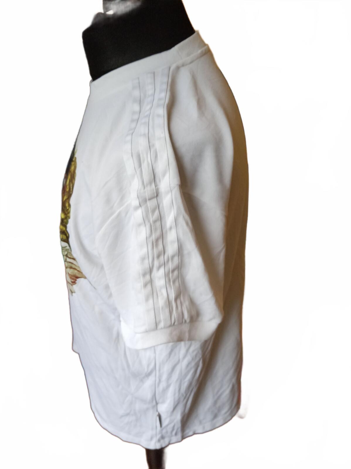 Adidas White Graphic T-Shirt with Angel Design and Side Stripe Detail - Size 10